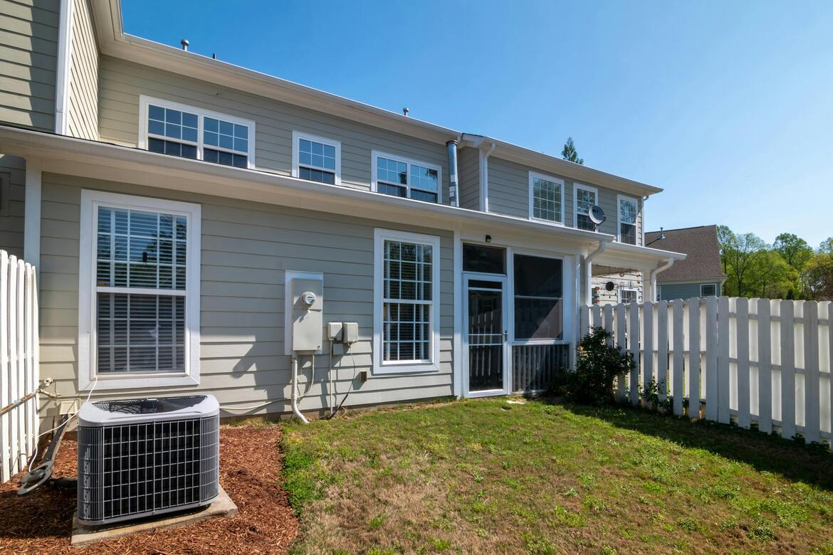 HVAC system in a suburban homeowner's backyard