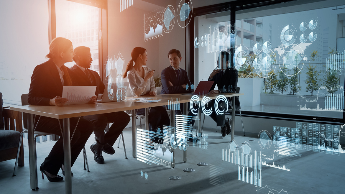 A business meeting with a virtual overlay of data, representing AI use