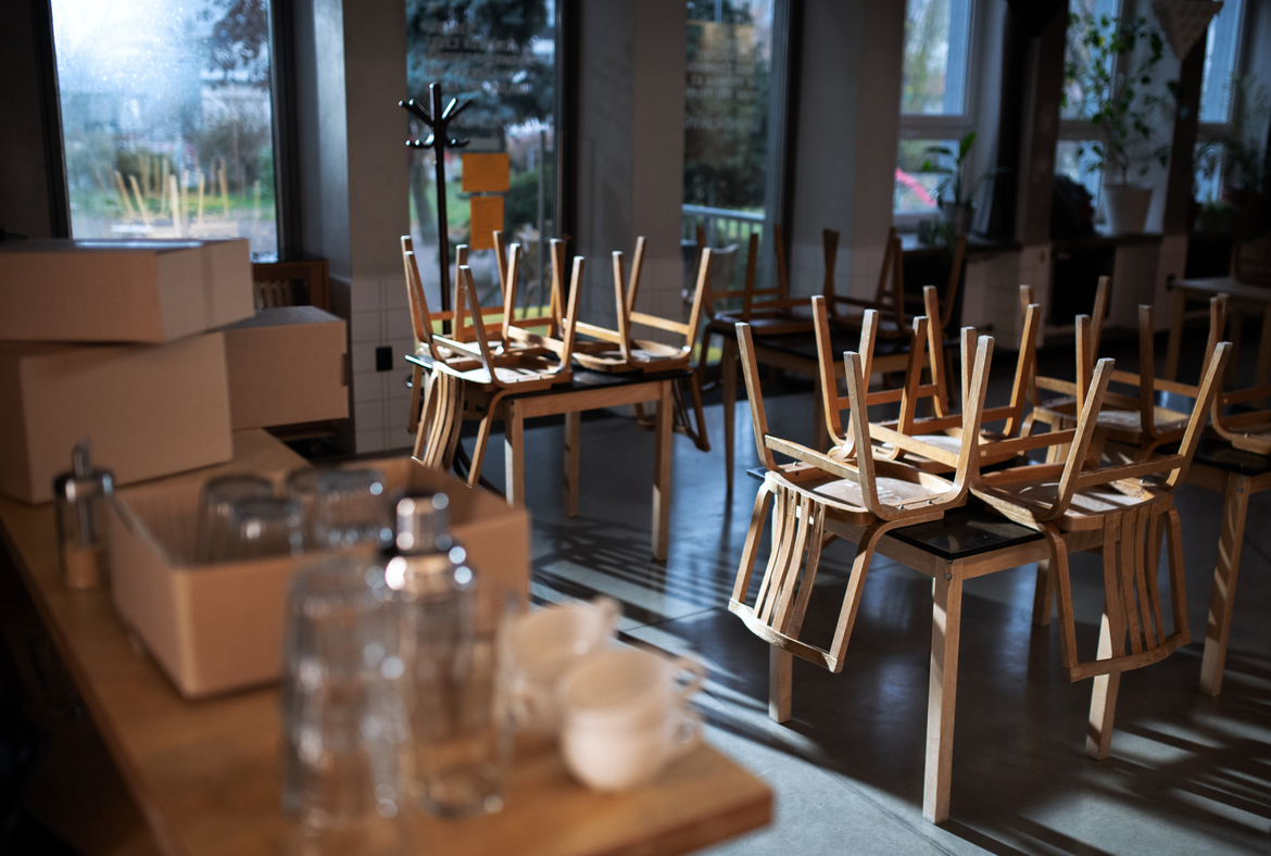 Closed restaurant with chairs on tables, representing the need for business income insurance for restaurants
