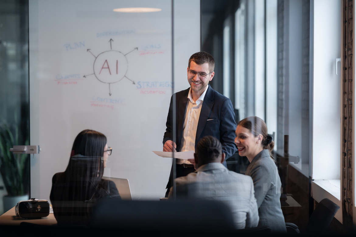 An IT consultant speaks to a group of business professionals