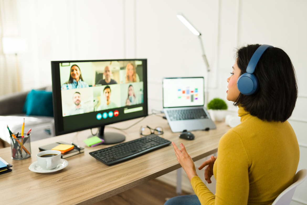 Remote worker on a video conference, representing workers in multiple states and workers’ compensation obligations